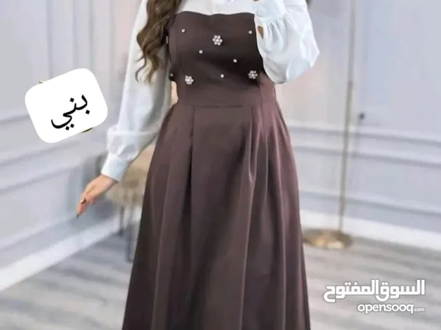 تجديد الكميه بالوان جديده وسعر ارخص كولكشن عيد الاضحى فستان يتميز ب كمام قميص مع زمه عالخصر الم