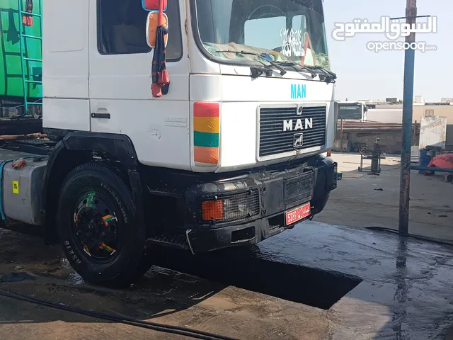 man truck and water tanker