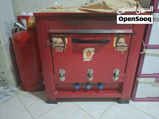 فرن غاز فلاحي مع أسطوانة غاز كبيرة