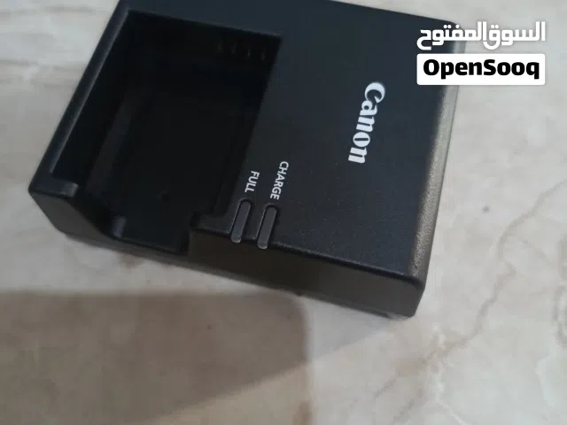 شاحن كاميرا كانون اصلي  بحالة الوكالة والجديد