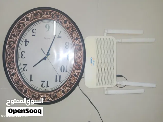 Wall Clock with Omantel Wi-Fi Router for Sale