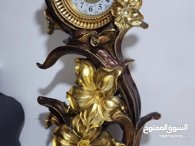 Decorative clock with polyester base