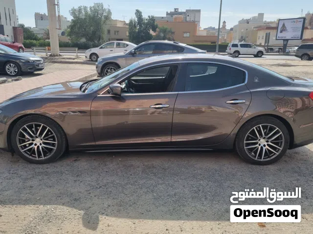 Used 2014 Maserati Ghibli Sedan in Brown with Advanced Features