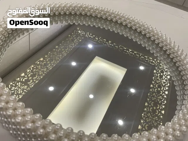 صينية دائرية مصنوعة من خرز الؤلؤ