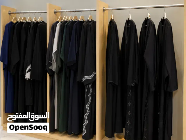ستان عرض ملابس ورفوف