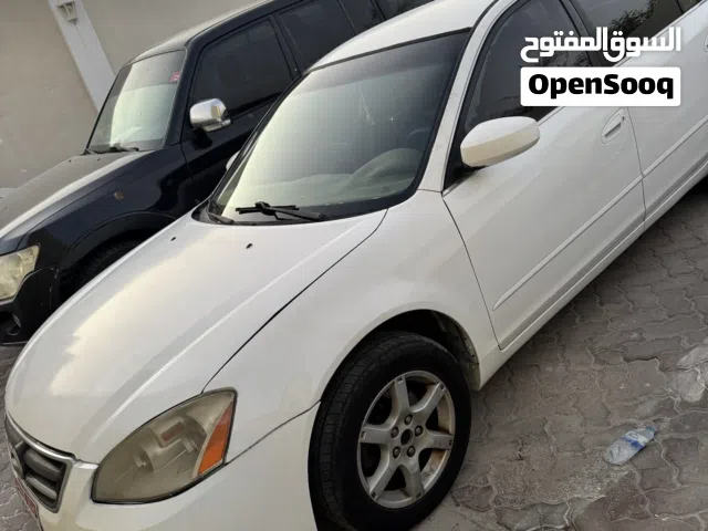 2005 نيسان التيما SL