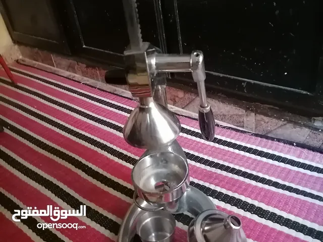 عصارة يدوية الليمون والبرتقال من الإنوكس