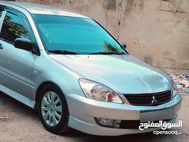 متسبيشي لانسر 2012 ماتور 13