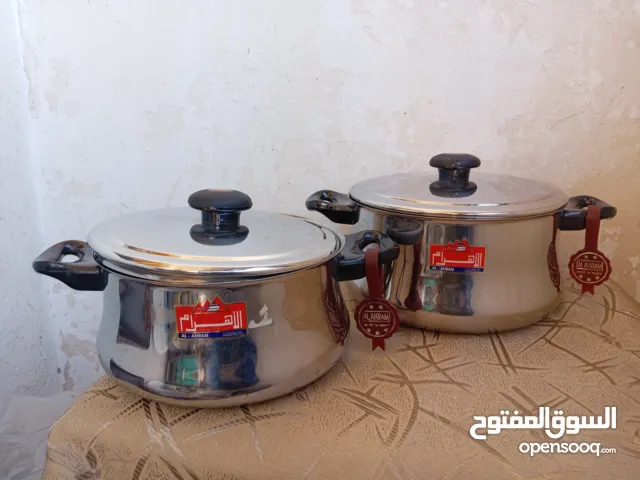 4 حلل ستنلس ستيل بومبيه الأهرام بمقابض لا توصل الحراره