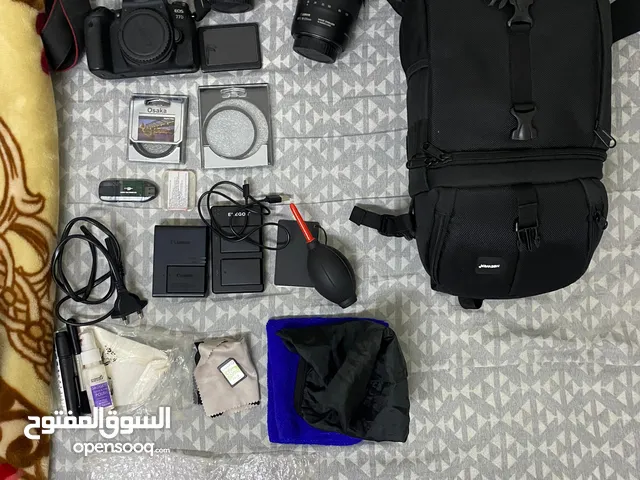 Canon 77d with extra batteries, cleaning kit, new backpack