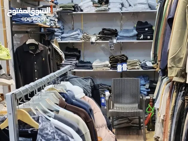 محل ملابس رجالي للبيع