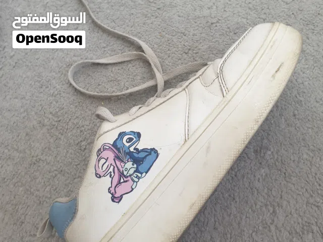 Chaussures stitch blanche