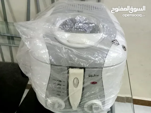 مكواة بخار + مقلاة كهرباء