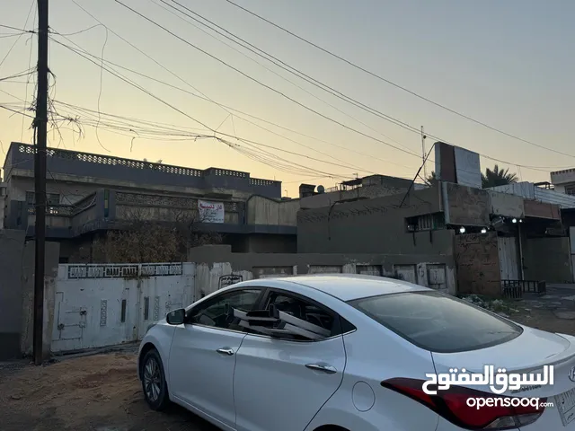 بيت 600 متر طابقين شارع كلية الادارة و الاقتصاد في الطالبية موقع تجاري