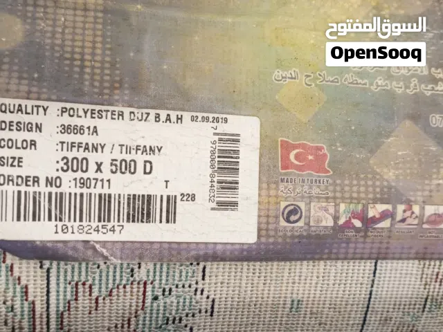 زولية شتوية جديده ما مستعمله لون فيروزي نقشات مختلفه