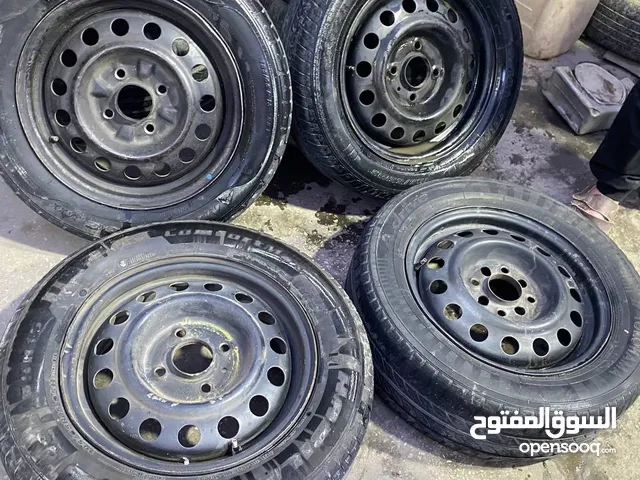 طقمين جنطات حديد سبيرات اصليات 14 و13 اربع براغي مع كوشوك للبيع او للبدل