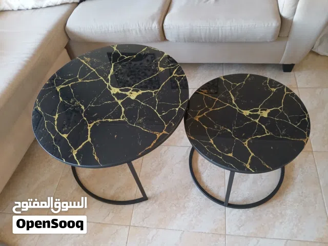 طاولتين وسط مرخمات للبيع
