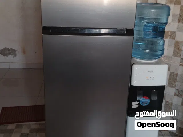 تلاجه تي سي ال