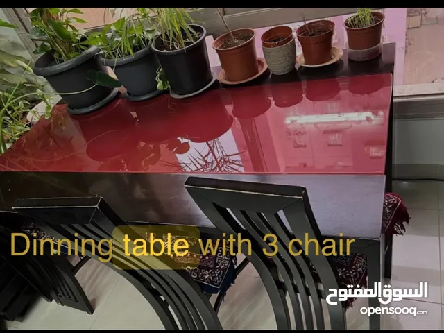 Alghanim glass top dinning table 100 cm*180 cm with 3 chairs - 10 Buffet table - 10 Both togather-15