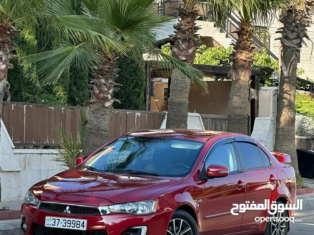 ميتسوبيشي لانسر EX موديل 2016 لون خمري