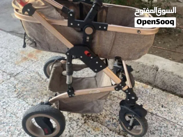 عربانه اطفال البيع تتحول جلوس ومنام كاروك مستخدمة ومابيها شي من عمر شهر الى 5 سنين لون جوزي فاتح 60
