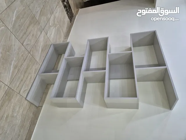 مكتبه كتب فيها خمس رفوف ( تكسير اسعار ؟!!)