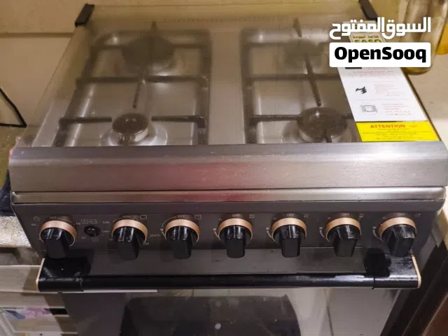 Toshiba 4 burners cooker with oven