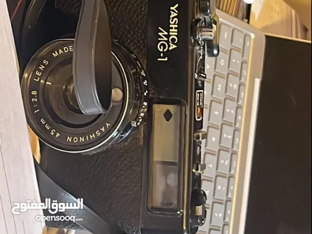 كاميرا فنتيج قديمة Yashica mg-1 جلد باللون الأسود معها حزامها شغالة للبيع   بدون شريط فيلم