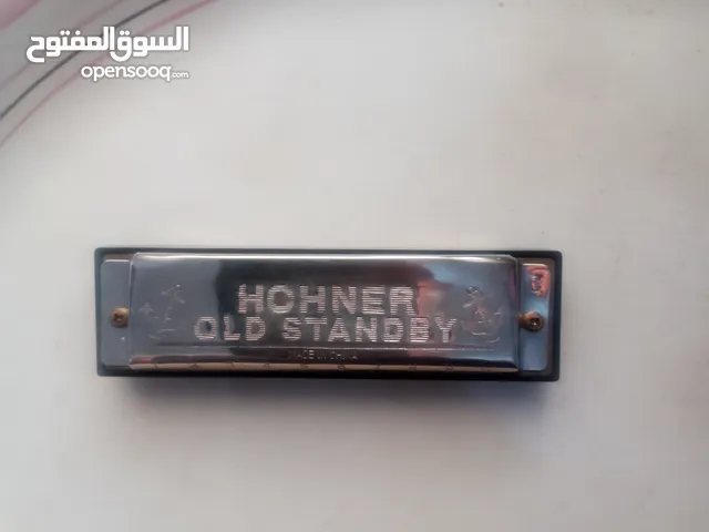 ألة موسيقية كلاسيكية هارمونيكا شبه وكالة مصنوعة من النحاس والبلاستيك القديم