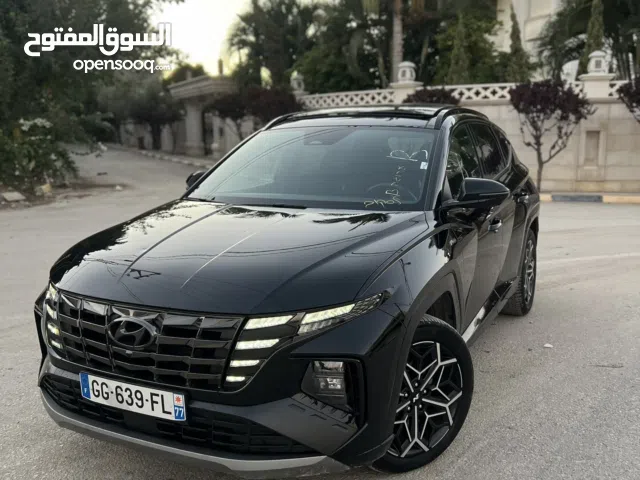 توسان هايبرد بلج ان فل مواصفات امكانيه البدل