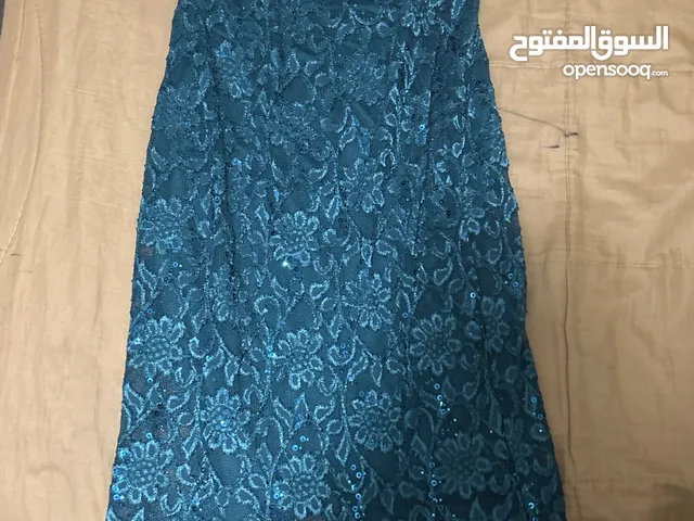 فستان اخضر غامق فخم