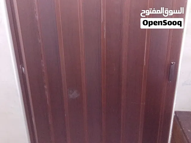 خزانه احذيه وشناتي سفر وباب اكورديون