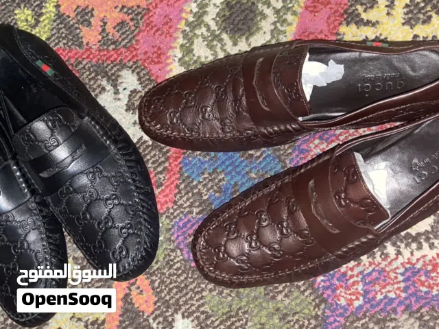 حذاء غوتشي متوفر 2 اسود وبني