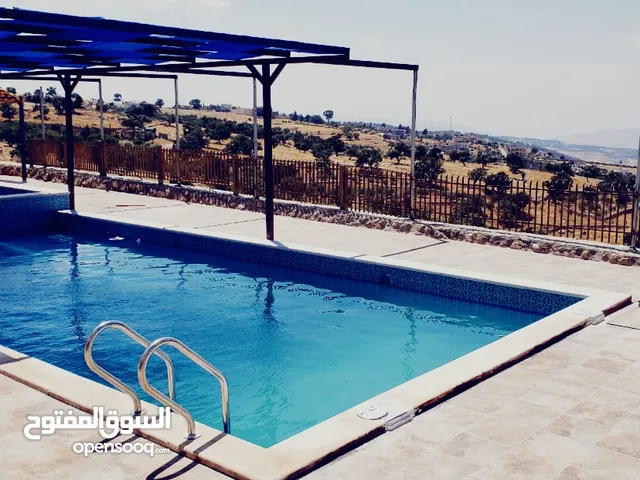 مزرعة بموقع مميز مرتفع وكاشف جاهزة مسبح مزروعة
