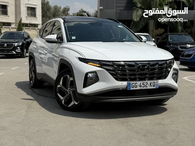 هونداي توسان ترخيص 2022 محرك 1600 هايبرد plug in/يقطع على الشحنه 52 كيلو متر