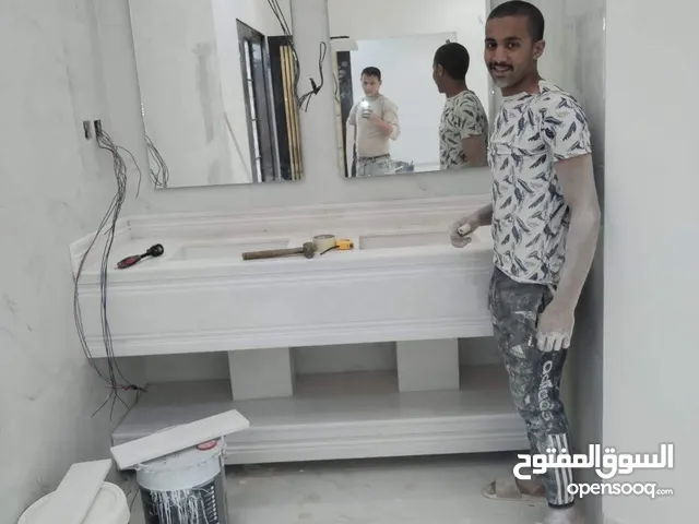 معلم رخام بجميع اعمال مطابخ مغاسل الطاولات باحدث الموديلات وجميع الصيانه