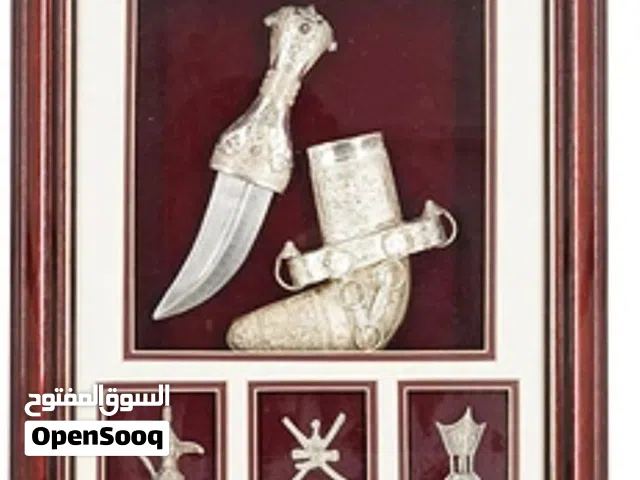 لوحه مع مجسمات من التراث العماني