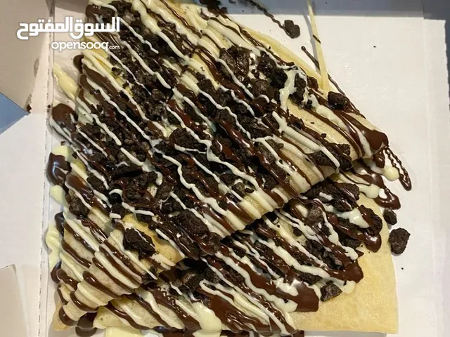 رشة سكر.. جاهز تعيش لحظات لذيذة؟ حضّرنا لك أحلى تشكيلة دونات طازجة وكريب طازج