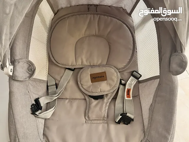 كرسي هزاز كهربا للبيبي من عمر يوم لعمر 9 اشهر مع كراجة للأطفال مستعمل بحالة الجديد.