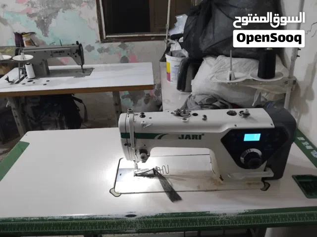 مكانتين خياطة واحدة يابانى والثانية نصف كمبيوتر