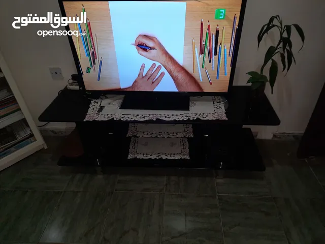 شاشة وطاولة تلفزيون ورسيفر