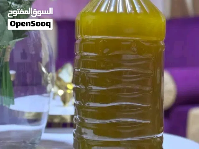 زيت الرويمي.  نكهة الطبيعة في كل قطرة!   اكتشفوا الجودة الحقيقية مع زيت الرويمي البكر الممتاز زيت