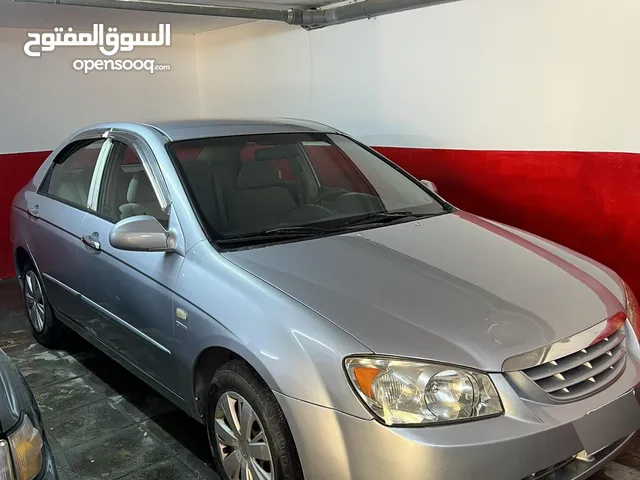 كيا سيراتو 2004 اتوماتيك لون سلفر بحاله جيده جدا للبيع