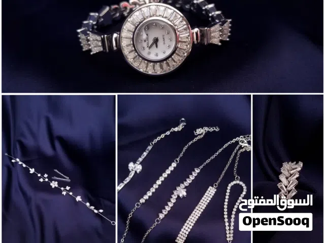طقم الأناقة الفاخرة اللذي يتكون من ساعة ومجموعة أساور وخاتم واكسسوار شعر وكل قطعة من الزركون الفخم