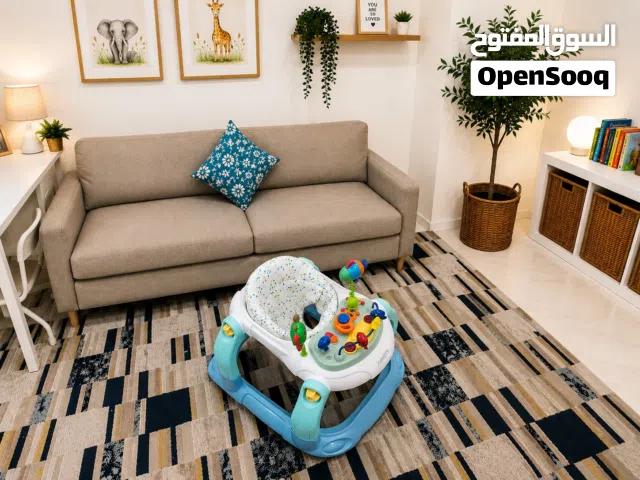 Junior Brand Baby Walker Almost New عربة للاطفال ماركة جونيور جديدة تقريباً