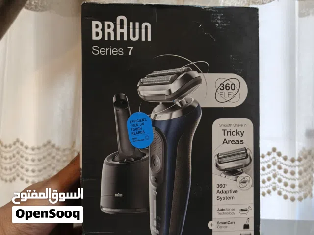 مكاين حلاقة براون و فرشاة أسنان فلبس جديد