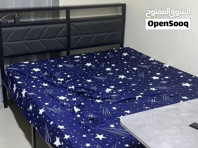 Queen size bed with light decoration and mat. Mostly new, used for months