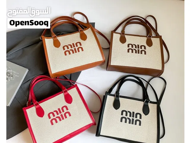 حقيبه حجم وسط min min اغلاق سحاب