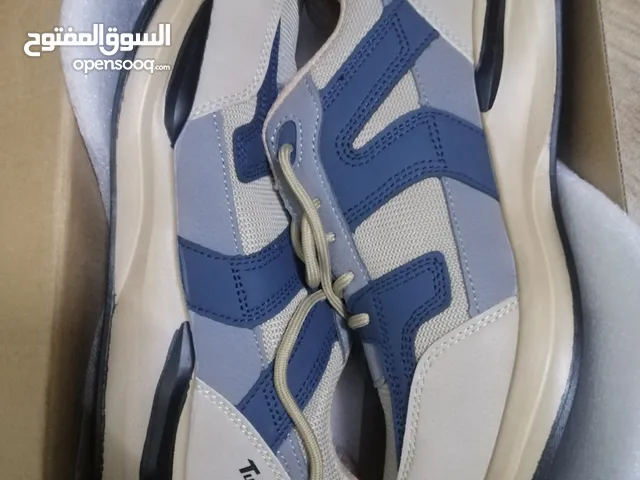 حذاء واقي/safety shoes