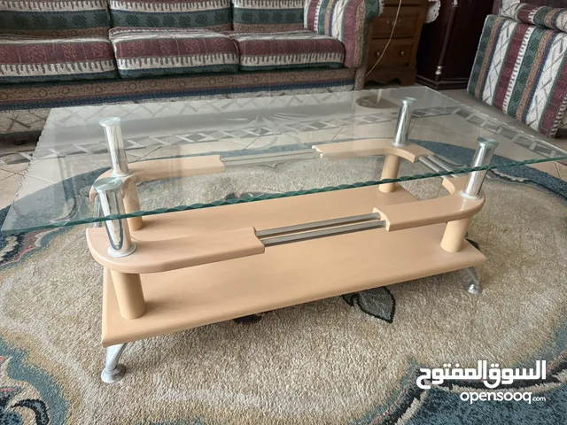 Elegant living room coffee tables sets of one big and two small glass top tables